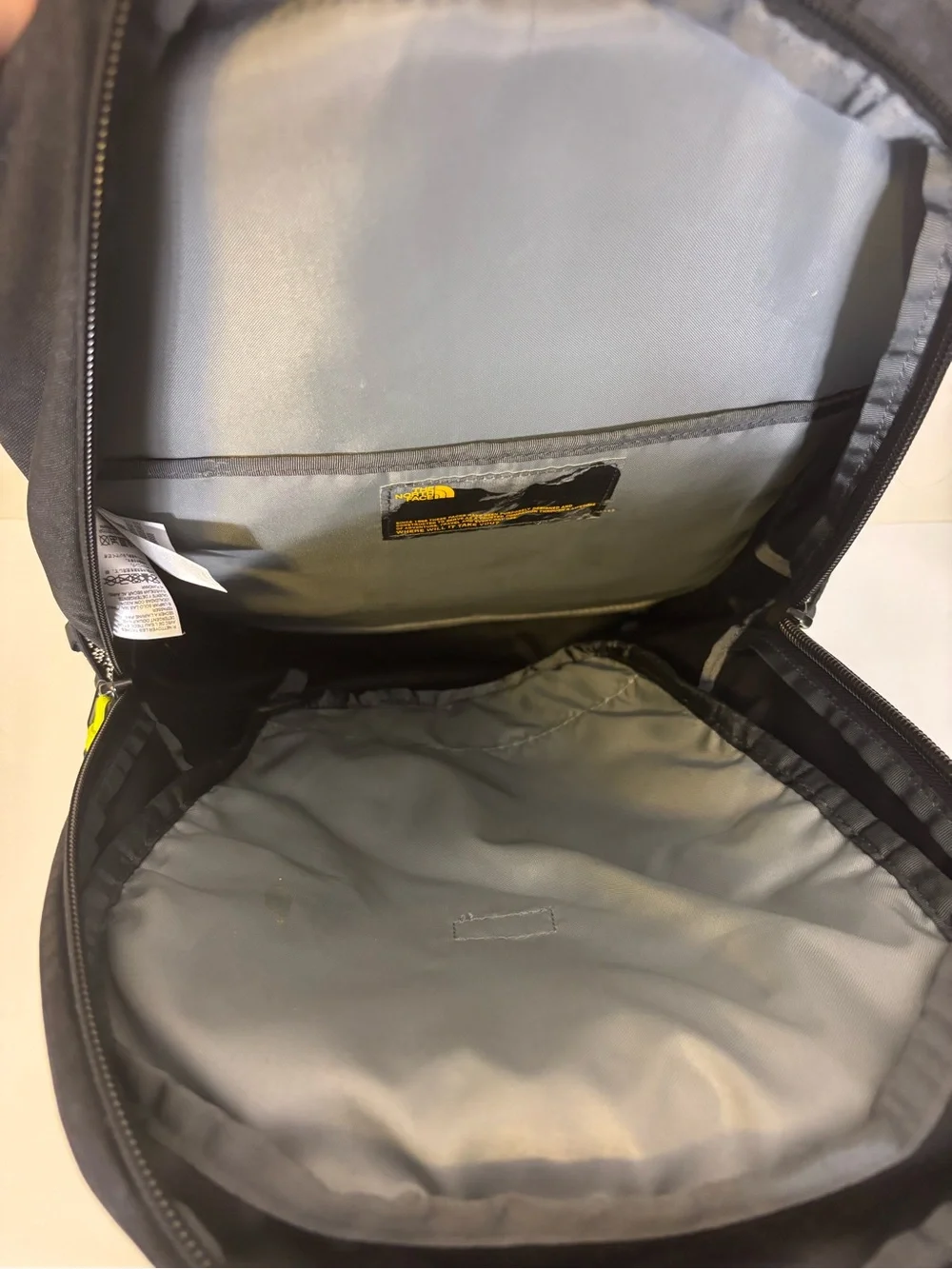 The North Face Black Backpack with Yellow Accents - Vault